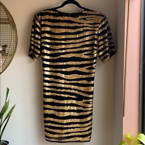 Black and gold sequin box dress